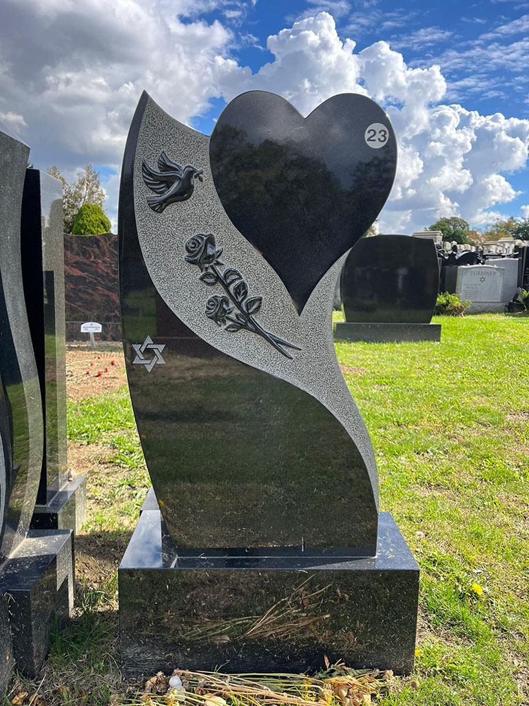 Single granite headstone memorial